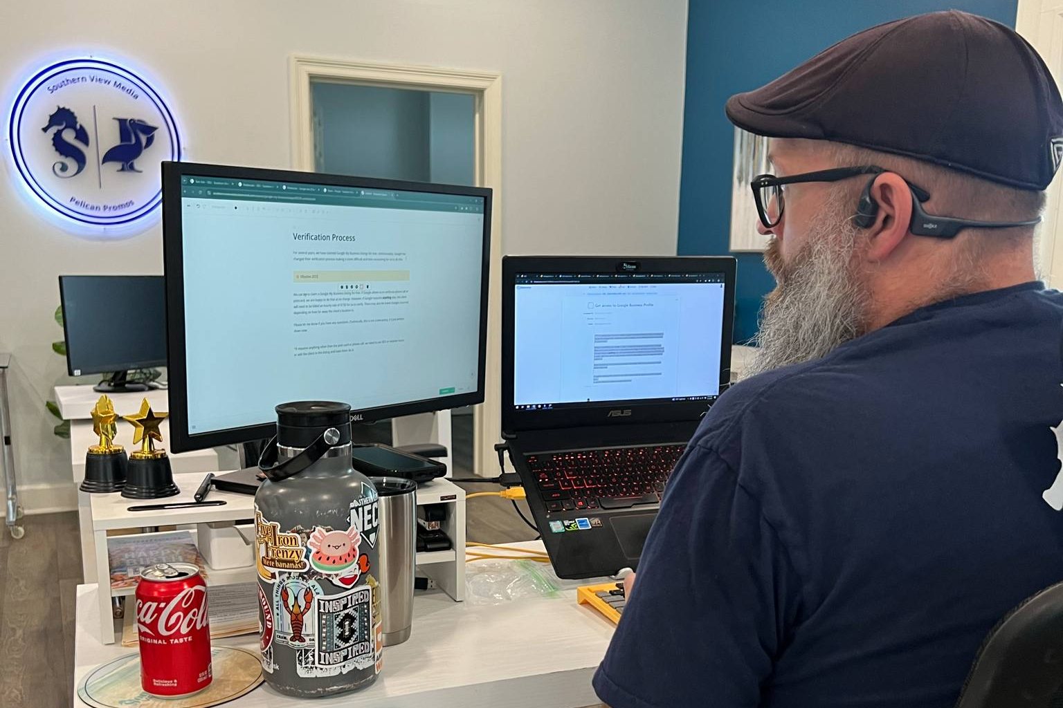 A Southern View Media team member working at a desk