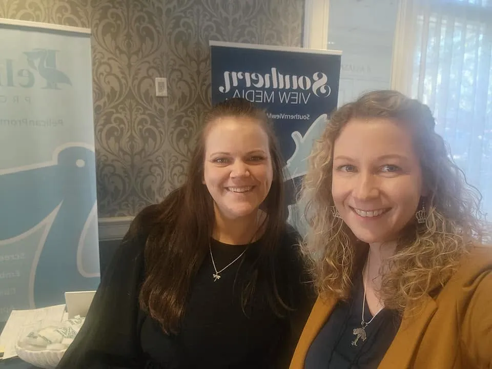 Two Southern View Media team members at a networking event